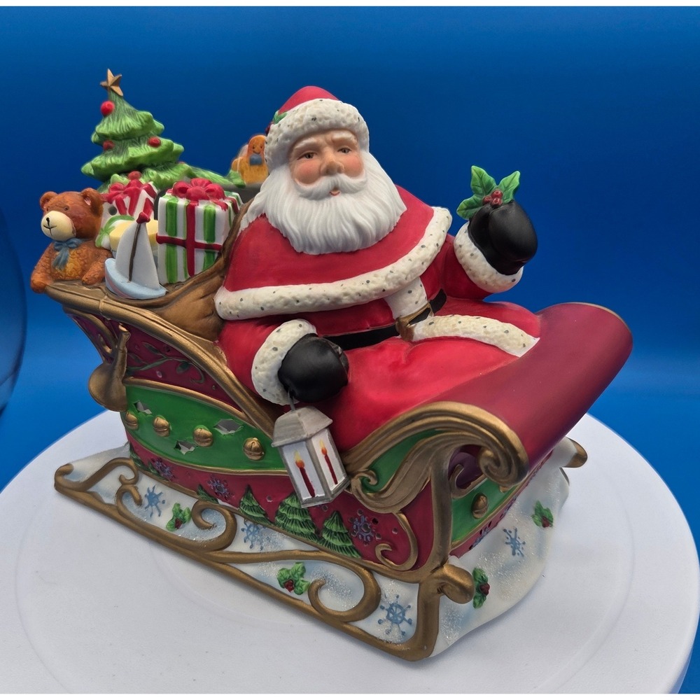 PartyLite Retired Santa's Sleigh Ride Tealight Holder designed by Susan Winget